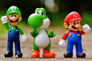Popular cartoon characters Mario, Luigi and Yoshi pose for a photo.