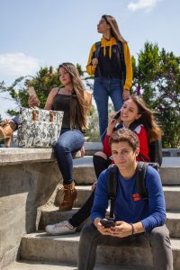 High school students sitting on stairs